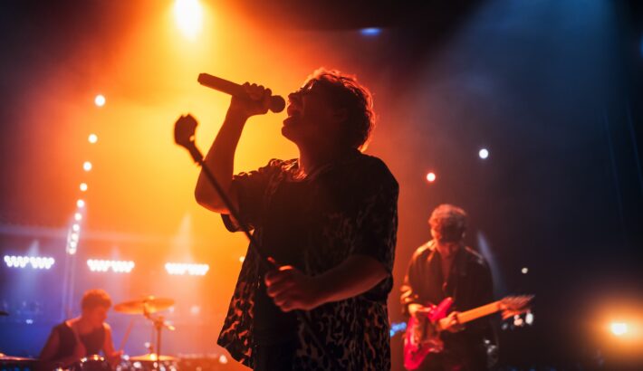 Portrait,Of,A,Stylish,Lead,Singer,Performing,At,A,Rock