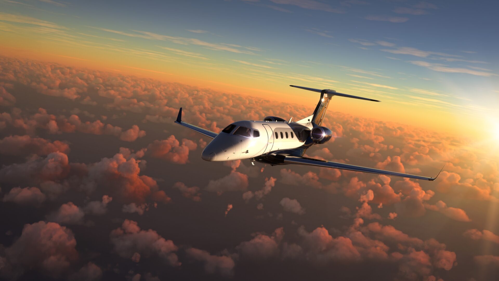 Private,Jet,Flying,Over,Amazing,Sunset
